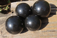 Polished Black Basalt Spheres  x 4 From Madagascar - Toprock Gemstones and Minerals