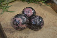 Polished Rhodonite Spheres  x 4 From Ambindavato, Madagascar - Toprock Gemstones and Minerals