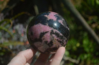 Polished Rhodonite Sphere x 2 From Ambindavato, Madagascar - Toprock Gemstones and Minerals
