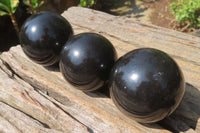 Polished Black Basalt Spheres x 12 From Madagascar - Toprock Gemstones and Minerals
