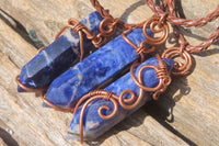 Polished Copper Wire Wrapped Sodalite Pendants x 12 From South Africa - Toprock Gemstones and Minerals