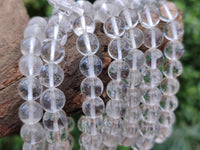 Polished Rock Crystal Stretch Buddha Bracelets - Sold Per Item - From Brazil - Toprock Gemstones and Minerals