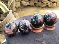 Polished Rhodonite Spheres x 6 From Ambindavato, Madagascar - Toprock Gemstones and Minerals