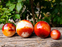Polished Carnelian Agate Spheres x 4 From Madagascar - Toprock Gemstones and Minerals