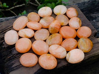 Polished Orange Twist Calcite Palm Stones x 24 From Madagascar - Toprock Gemstones and Minerals