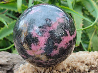 Polished Rhodonite Spheres x 2 From Ambindavato, Madagascar - Toprock Gemstones and Minerals
