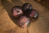 Polished  Pink & Black Rhodonite Spheres x 4 From Madagascar - Toprock Gemstones and Minerals
