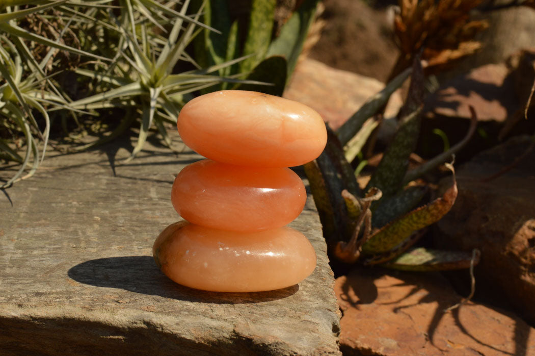 Polished Vibrant Orange Twist Calcite Palm Stones x 12 From Madagascar - TopRock