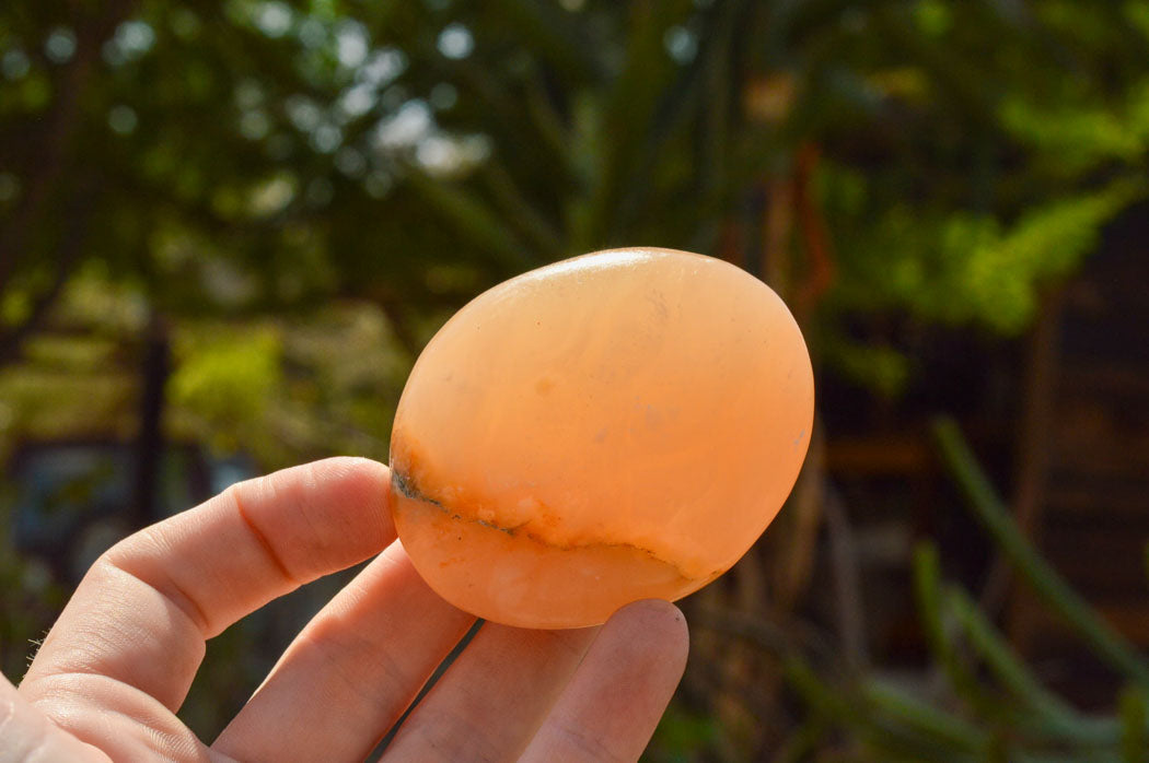 Polished Vibrant Orange Twist Calcite Palm Stones x 12 From Madagascar - TopRock