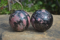 Polished Rhodonite Spheres x 2 From Ambindavato, Madagascar - Toprock Gemstones and Minerals