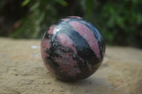 Polished Rhodonite Spheres x 2 From Ambindavato, Madagascar - Toprock Gemstones and Minerals