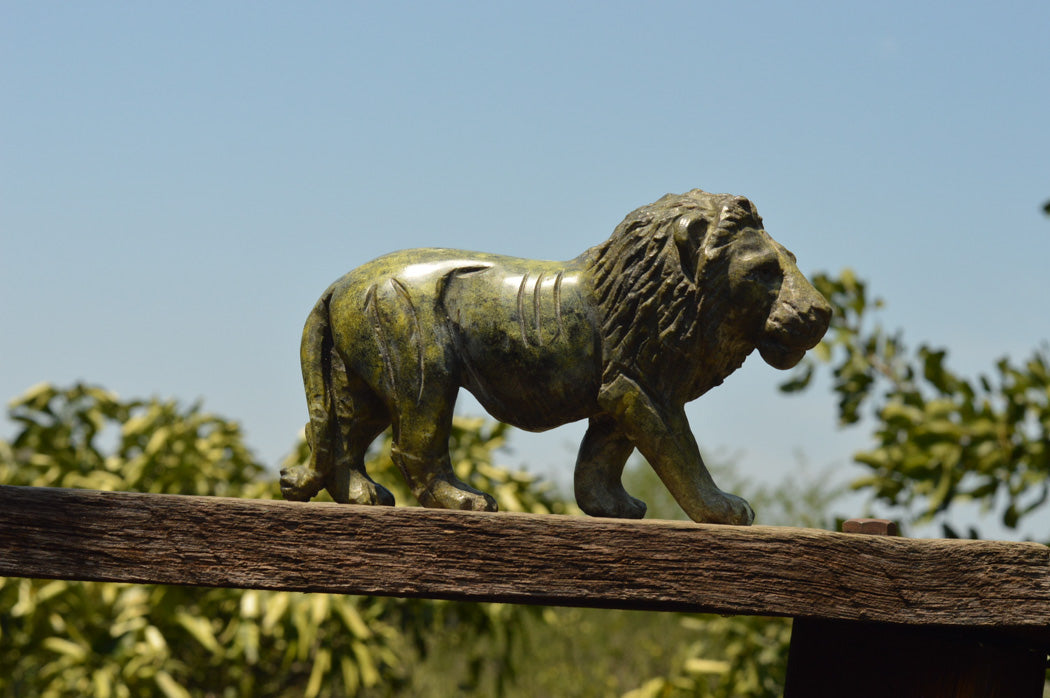 Polished Leopard stone Lion Carving x 1 From Zimbabwe - TopRock