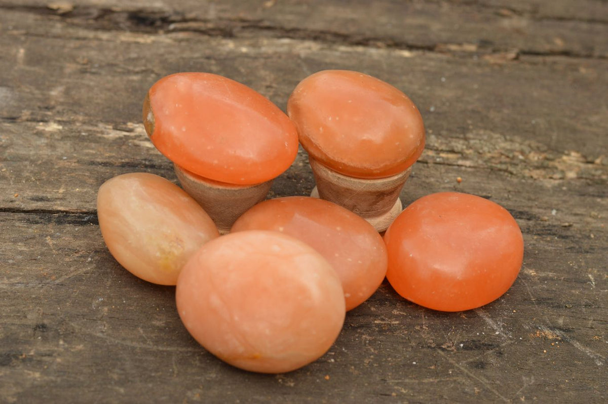 Polished Killer Bright Orange Twist Calcite Palm Stones x 12 From Madagascar - TopRock