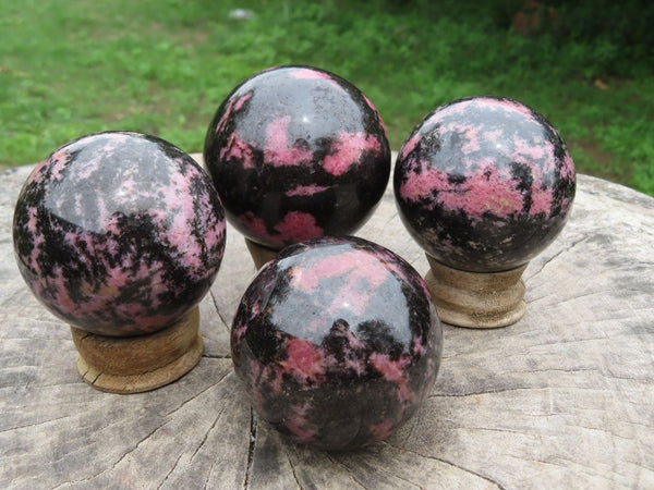 Polished Red Rhodonite Spheres with Black Chromite x 4 From Ambindavato, Madagascar - TopRock