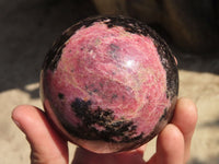 Polished Rhodonite Spheres x 2 From Ambindavato, Madagascar - Toprock Gemstones and Minerals