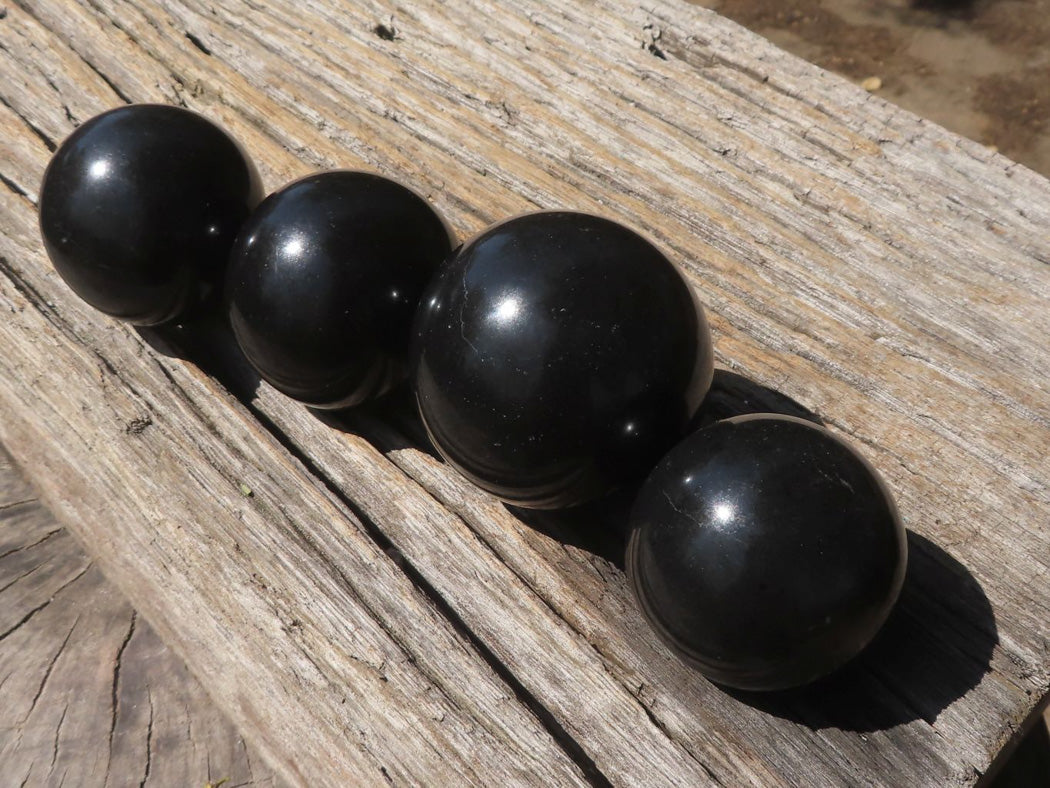 Polished Pitch Black Basalt Spheres x 6 From Madagascar - TopRock