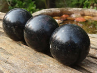 Polished Rare Sparkling Blue Iolite / Water Sapphire Spheres  x 12 From Madagascar - Toprock Gemstones and Minerals