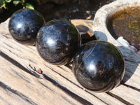 Polished Rare Iolite Spheres x 3 From Ambatofinandrahana, Madagascar - Toprock Gemstones and Minerals