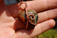 Polished Polychrome Jasper Mini Hearts Set In Copper Art Wire Wrap Pendant - sold per piece From Mahajunga, Madagascar - TopRock