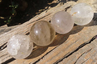 Polished Clear & Smokey Quartz Crystal Balls x 4 From Madagascar - Toprock Gemstones and Minerals 