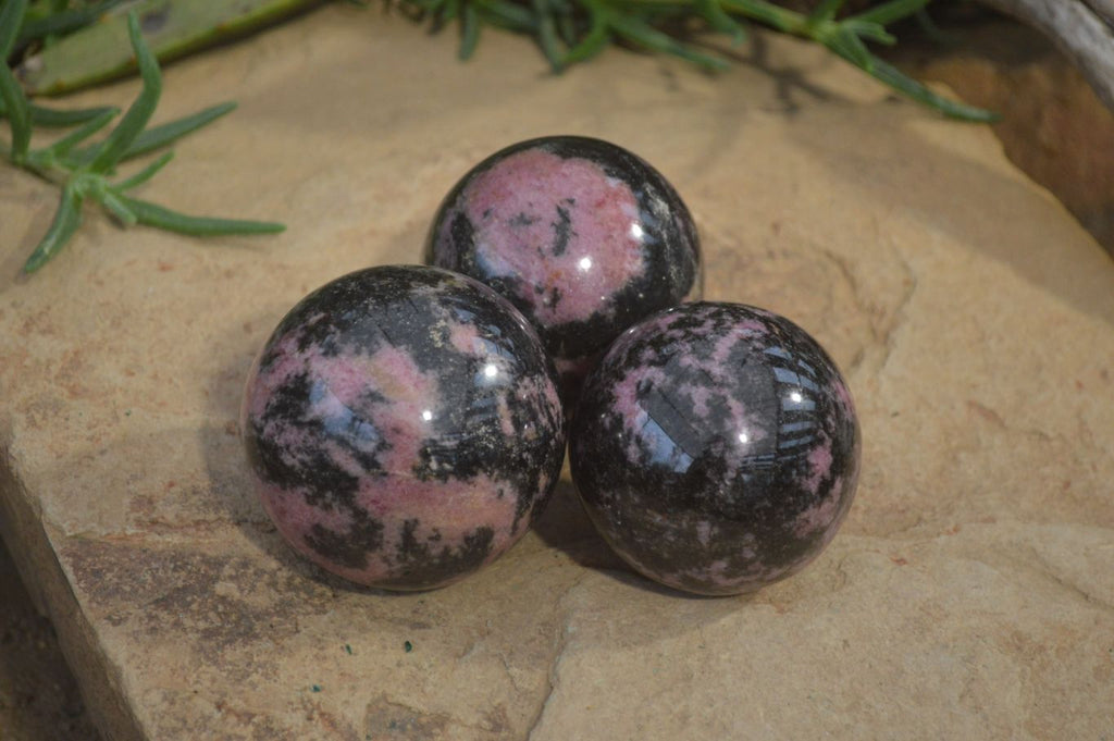 Polished Rhodonite Spheres  x 4 From Ambindavato, Madagascar - Toprock Gemstones and Minerals 