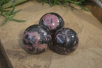 Polished Rhodonite Spheres  x 4 From Ambindavato, Madagascar - Toprock Gemstones and Minerals 