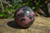 Polished Rhodonite Sphere x 2 From Ambindavato, Madagascar - Toprock Gemstones and Minerals 