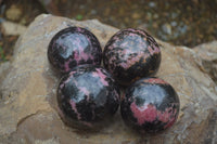 Polished Rhodonite Spheres x 4 From Ambindavato, Madagascar - Toprock Gemstones and Minerals 