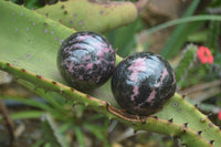 Polished Rhodonite Spheres x 4 From Ambindavato, Madagascar - Toprock Gemstones and Minerals 