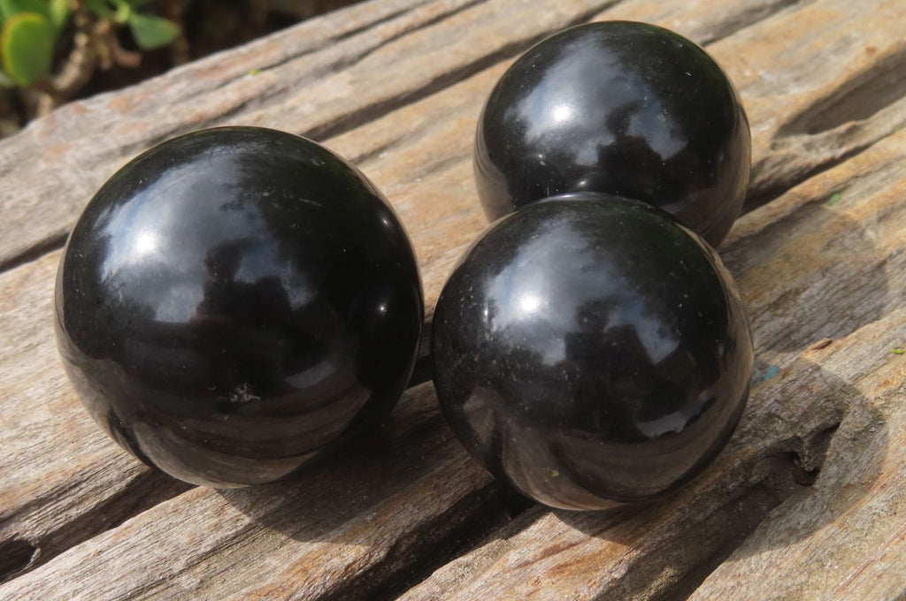 Polished Black Basalt Spheres x 12 From Madagascar - Toprock Gemstones and Minerals 