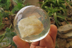 Polished Golden Rutile Quartz in PVC Resin Paperweight Spheres - sold per item - From Brazil - Toprock Gemstones and Minerals 