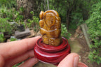 Polished Golden Tigers Eye Far Eastern Carved Gods on Wooden Stands - sold per Set of 7 - From South Africa - Toprock Gemstones and Minerals 