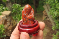 Polished Brecciated Jasper Far Eastern Carved Gods on Wooden Stands - sold per Set of 7 - From South Africa