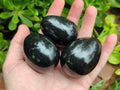Polished Black Basalt Eggs x 12 From Antsirabe, Madagascar - Toprock Gemstones and Minerals 