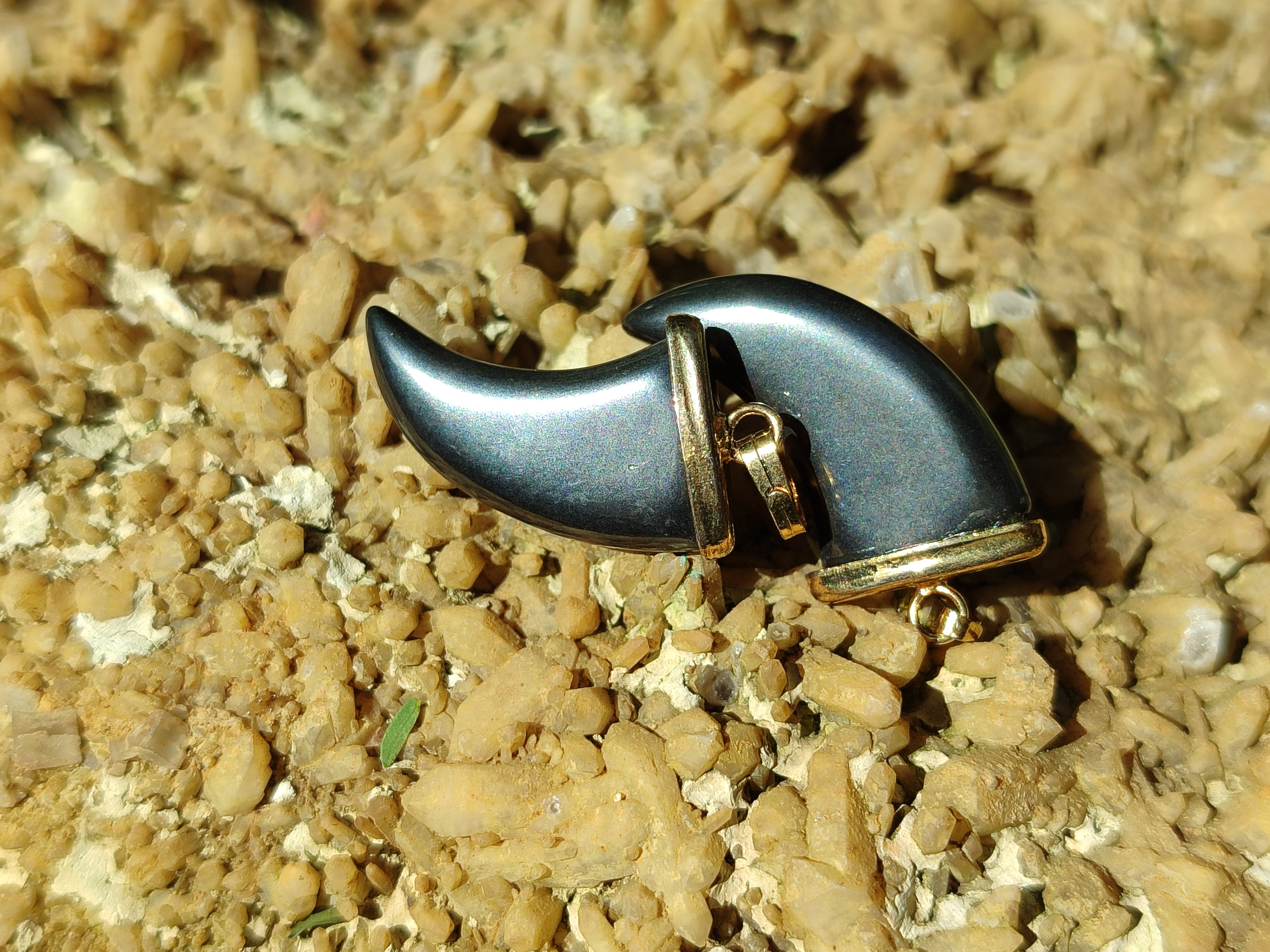 Polished Silver Hematite Lions Claw Pendant with Gold Cap & Bail - Sold Per Item - From China - Toprock Gemstones and Minerals 