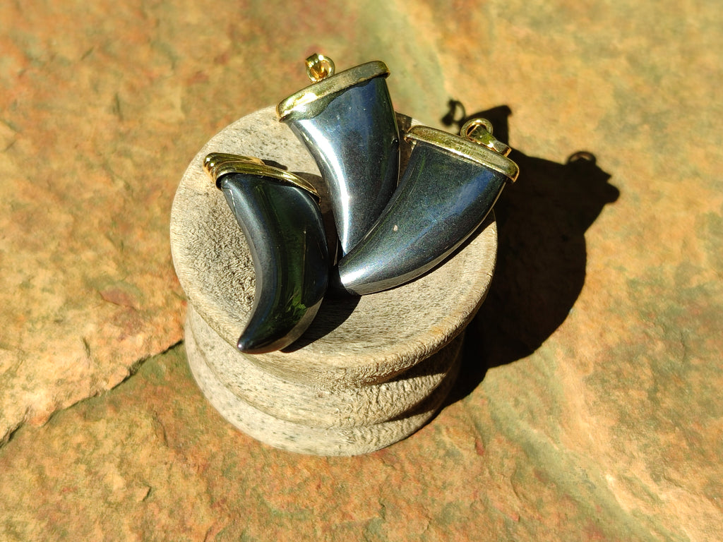 Polished Silver Hematite Lions Claw Pendant with Gold Cap & Bail - Sold Per Item - From China - Toprock Gemstones and Minerals 