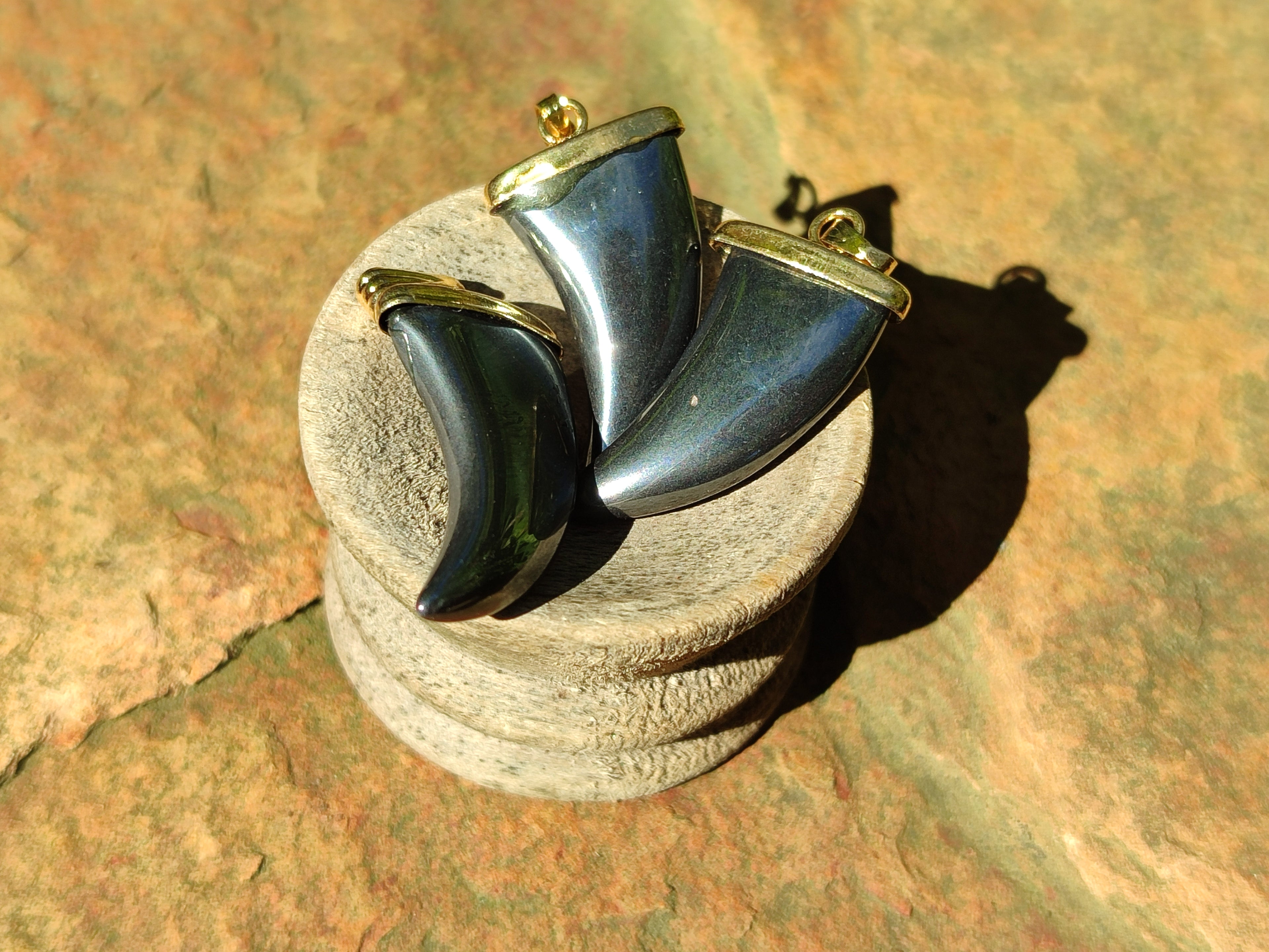 Polished Silver Hematite Lions Claw Pendant with Gold Cap & Bail - Sold Per Item - From China - Toprock Gemstones and Minerals 