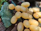 Polished Honey Aragonite Hanging Bunch of Grapes with Green Fuchsite Leaves - sold per item - From Namibia - Toprock Gemstones and Minerals 