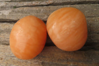 Polished Orange Twist Calcite Palm Stones x 20 From Madagascar - Toprock Gemstones and Minerals 