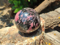 Polished Rhodonite Spheres x 2 From Ambindavato, Madagascar - Toprock Gemstones and Minerals 