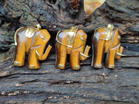 Polished Large Golden Tigers Eye Elephant Pendant with Gold Bail and Trim - Sold Per Item - From China