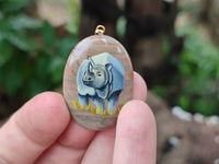 Polished Polychrome Jasper Pendant with Hand Painted Rhino - sold per item - From Madagascar