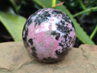 Polished Rhodonite Spheres x 4 From Rhusinga, Zimbabwe