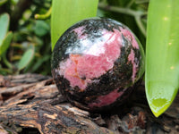 Polished Rhodonite Spheres x 4 From Rhusinga, Zimbabwe