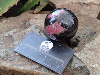 Polished Rhodonite Spheres x 4 From Rhusinga, Zimbabwe