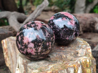 Polished Rhodonite Spheres x 4 From Rhusinga, Zimbabwe