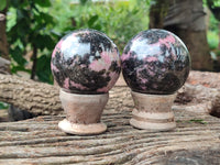 Polished Rhodonite Spheres x 4 From Rhusinga, Zimbabwe