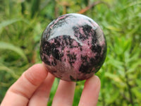 Polished Rhodonite Spheres x 4 From Rhusinga, Zimbabwe