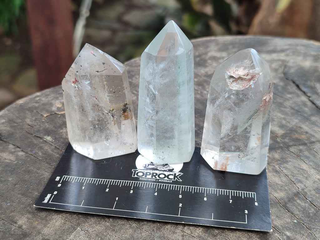 Polished Quartz Crystal Points with Various Inclusions x 11 From Madagascar - Toprock Gemstones and Minerals 