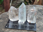 Polished Quartz Crystal Points with Various Inclusions x 11 From Madagascar - Toprock Gemstones and Minerals 